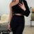 img_1394 One shoulder top met glitter - Zwart