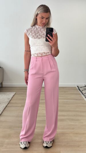 440dc483-be6b-4ce9-9fb0-65f1e9cdfe96 Licht roze wijde pantalon