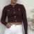 Bruine top met gouden knopen