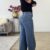 Tall jeans stretch met schuine knoop - crossover