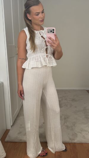 img_0335 Smocked witte top met strikjes